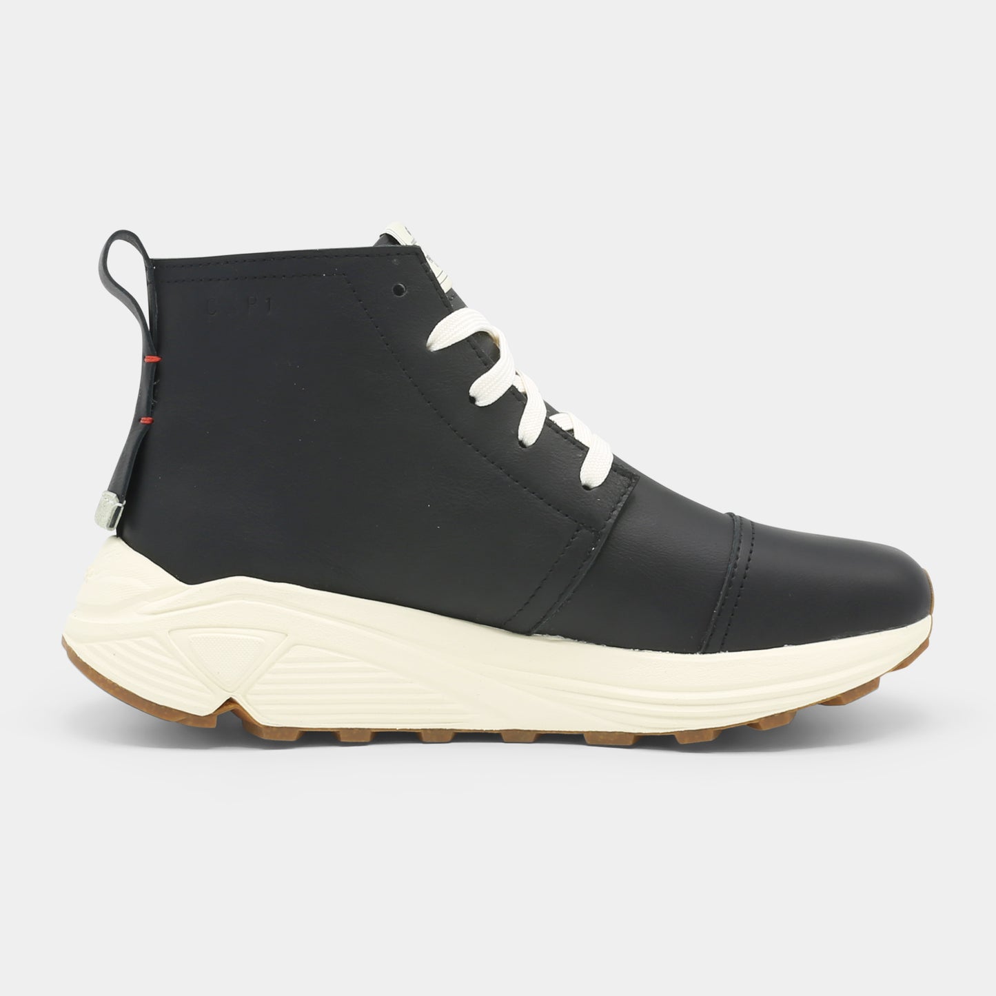 A black high-top urban utility chukka boot with white laces and a chunky white sole medial view.