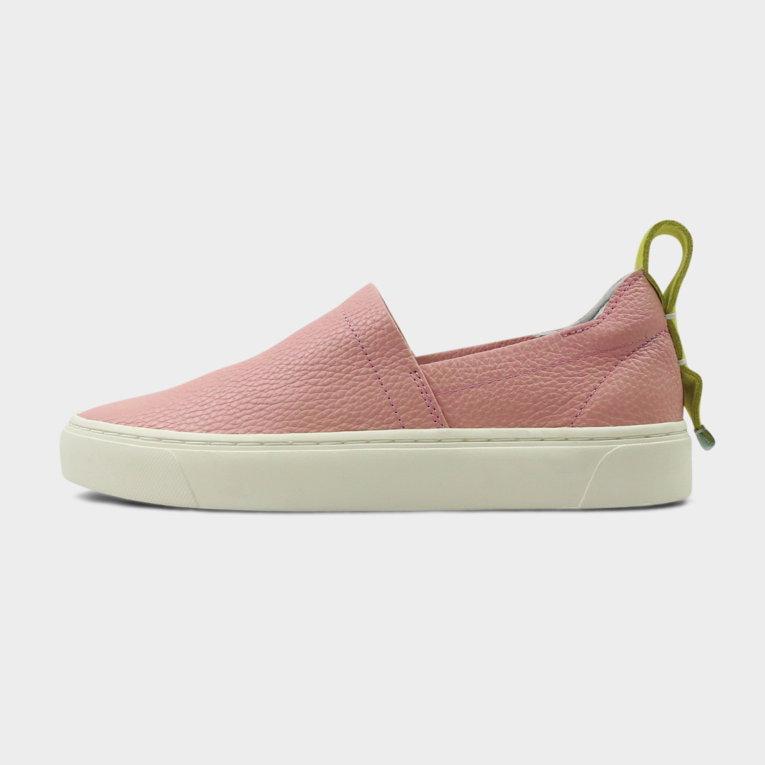 A pink slip-on men's shoe with a suede and leather upper and a rubber sole lateral view
