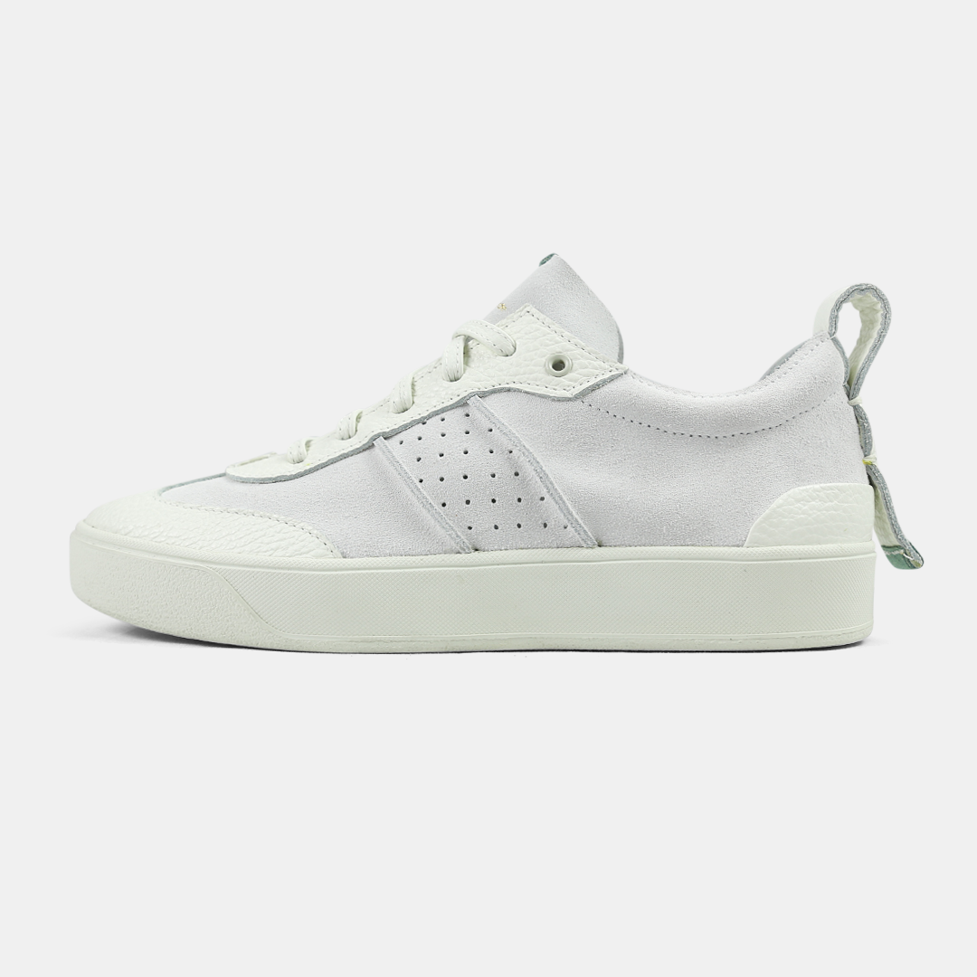 A white men's sneaker with a lace-up closure, made from Italian leather, with a rubber cupsole lateral view