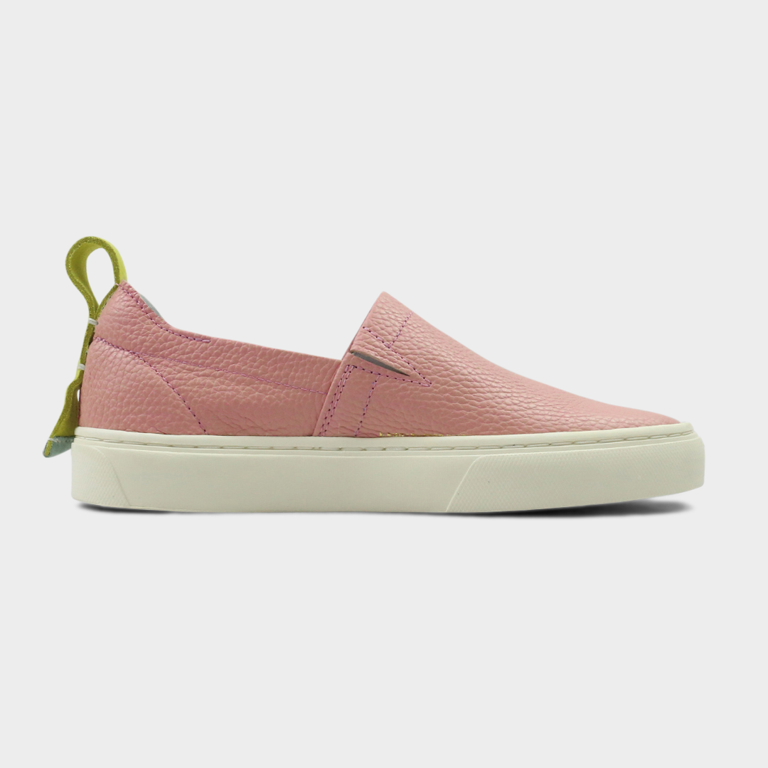A pink slip-on men's shoe with a suede and leather upper and a rubber sole medial view
