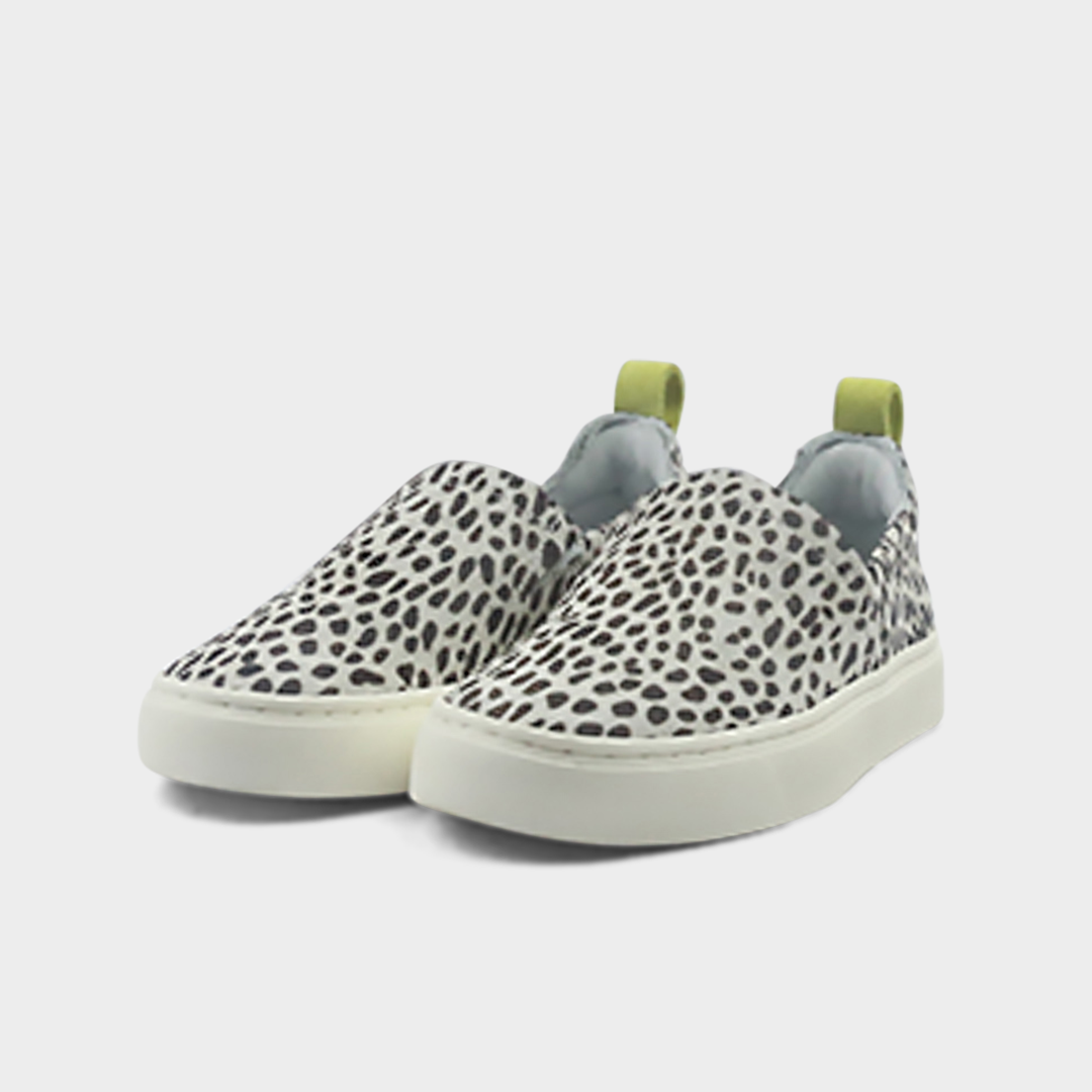 A cheetah print slip-on men's shoe with a suede and manmade material upper and a rubber sole quarter view