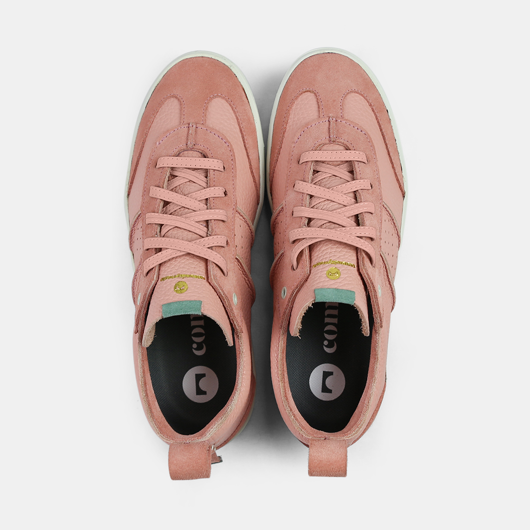 A pink men's sneaker with a lace-up closure, made from Italian leather, with a rubber cupsole top view