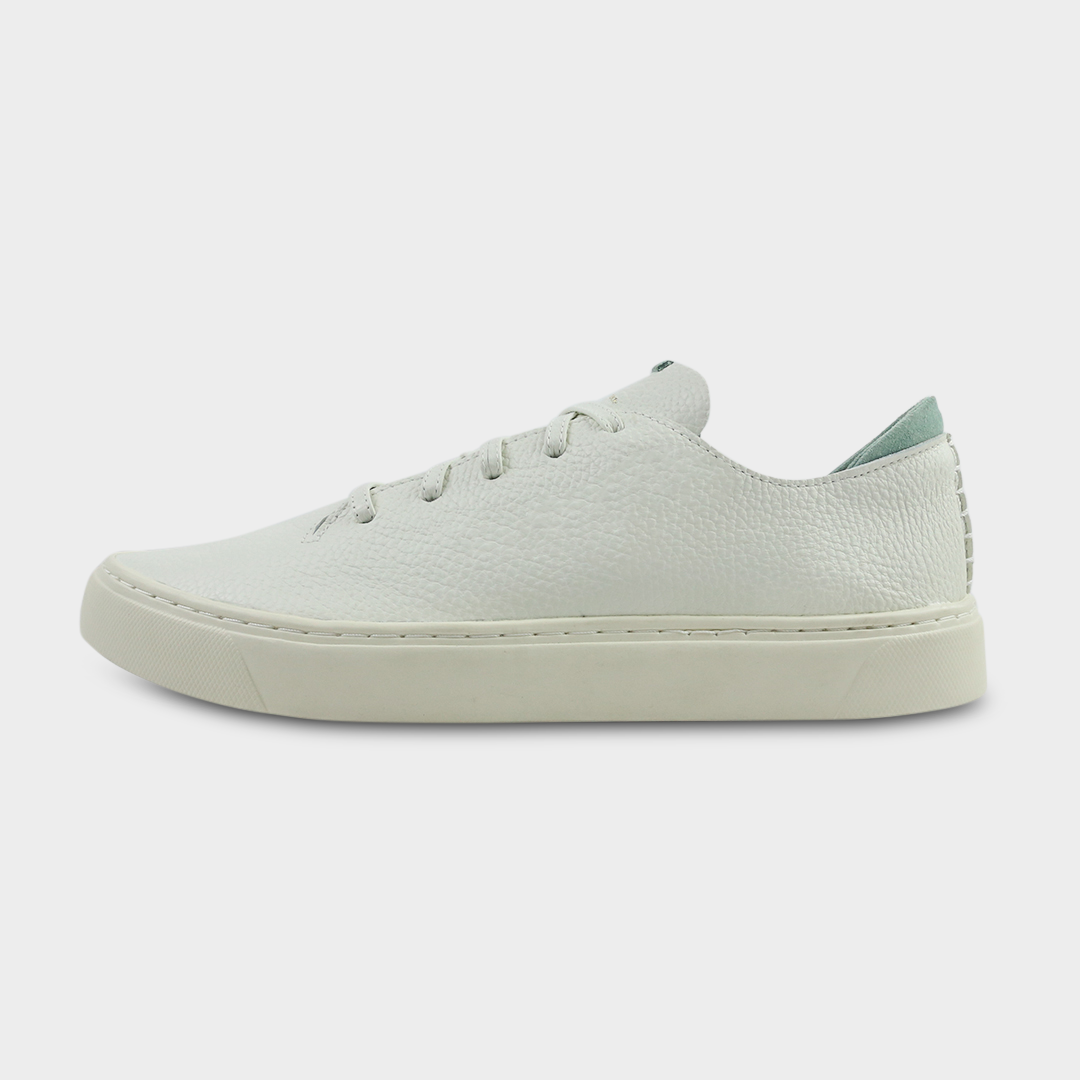 A women's sneaker in off-white color, made of Italian full grain leather, with a lace-up closure lateral