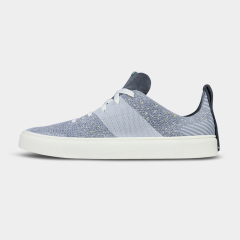 A gray and beige knit men's sneaker with Italian suede and leather accents, featuring a rubber cupsole and lace-up closure.